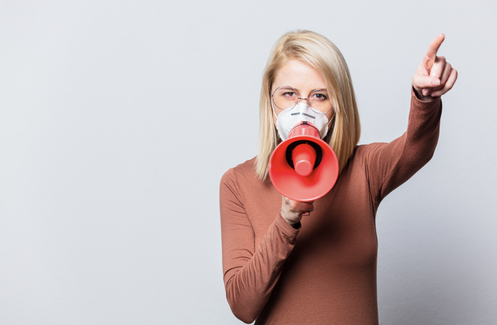 style blonde woman with red megaphone sm
